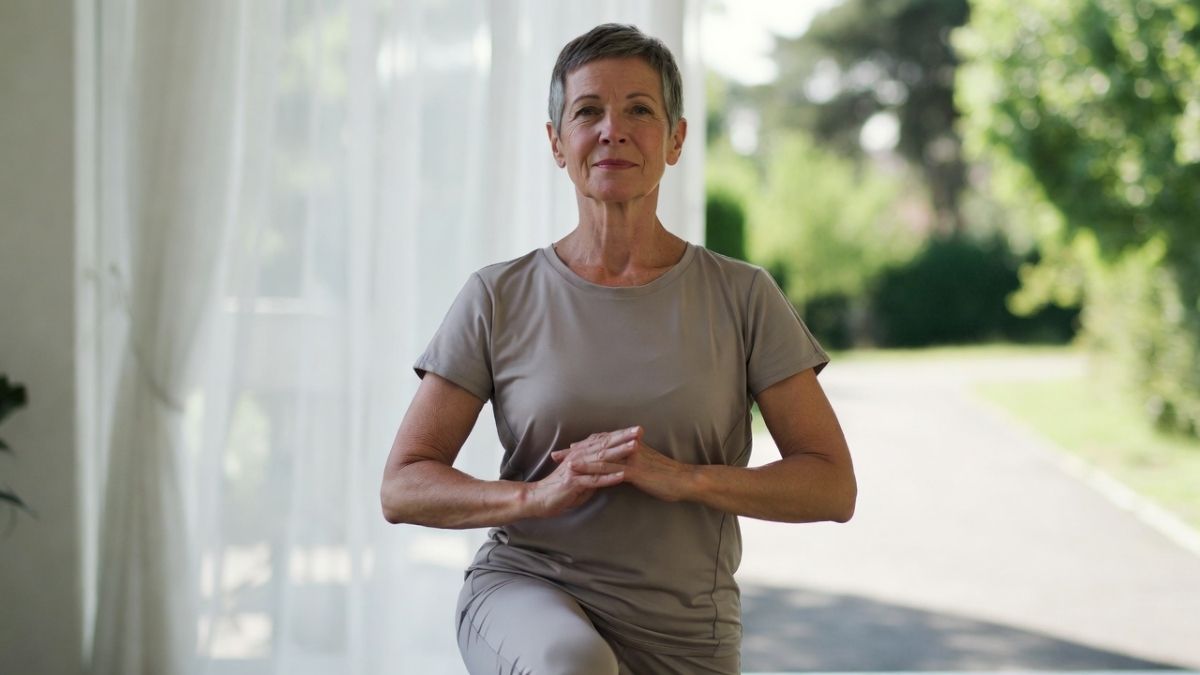 Adult performing gentle knee strengthening exercise to support knee pain relief